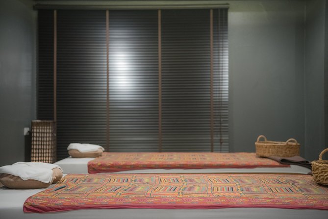 1 Hour The Home Signature Thai Balm Massage - Free Transportation - Changing clothes and preparing for the massage
