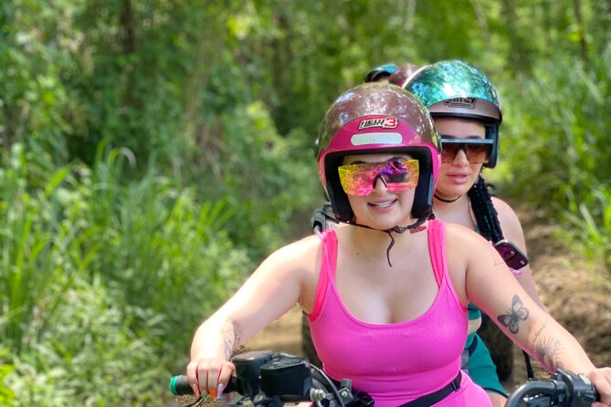 ATV and Bamboo Rafting With limestone foot massage and transport - Bamboo rafting slows the pace