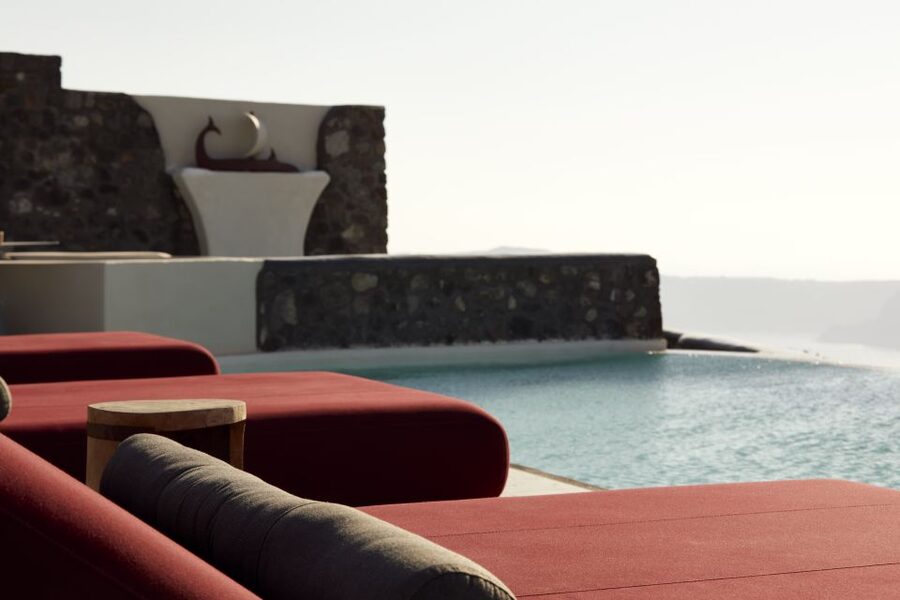 Daybed Relaxation with infinity pool use with caldera views - Arriving at White Pearl Cavalieri