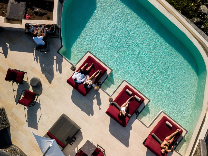Daybed Relaxation with infinity pool use with caldera views - Is $235 Good Value for Two?