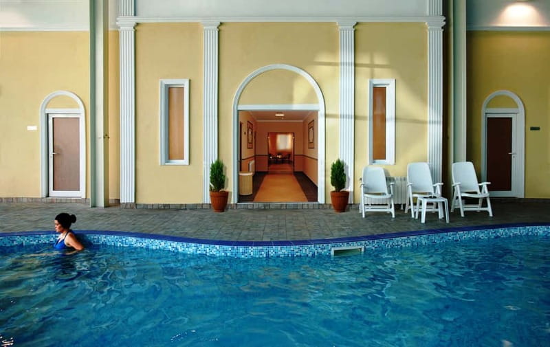 From Sofia: Rila Monastery UNESCO Site & Outdoor Mineral Spa - Sapareva Banya: hot pools with a mountain backdrop