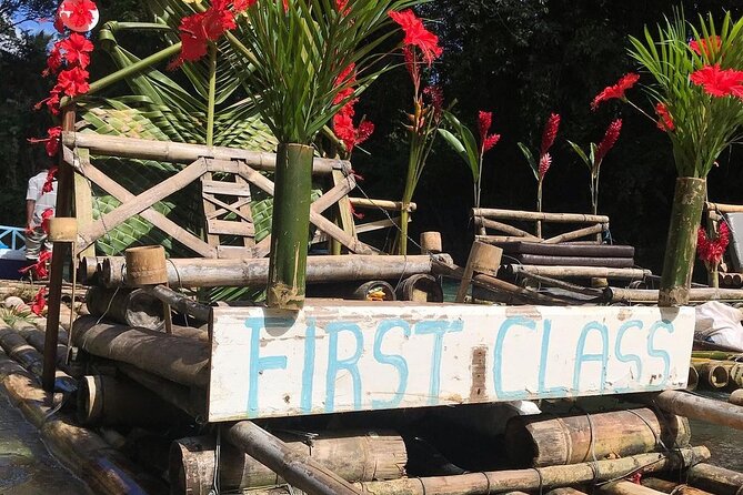 Great River Bamboo Rafting and Limestone Full Body Massage Tour From Montego Bay - Coconut, sugar cane, food, and river vendors