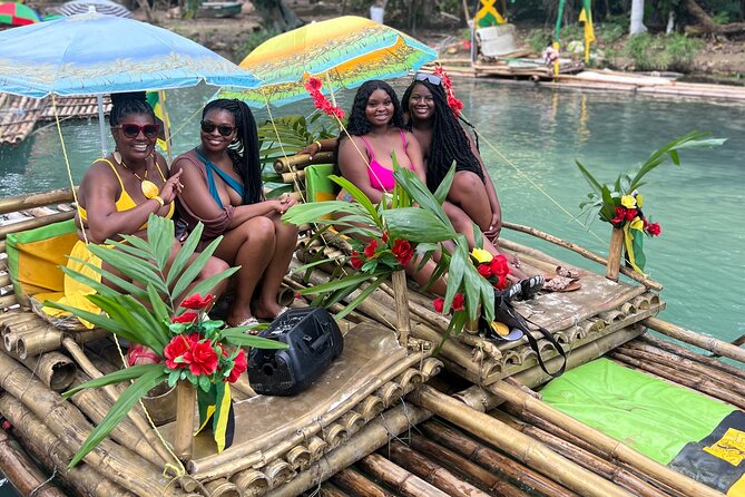 Great River Bamboo Rafting and Limestone Massage from Montego Bay - Boarding a 30-foot hand-built bamboo raft