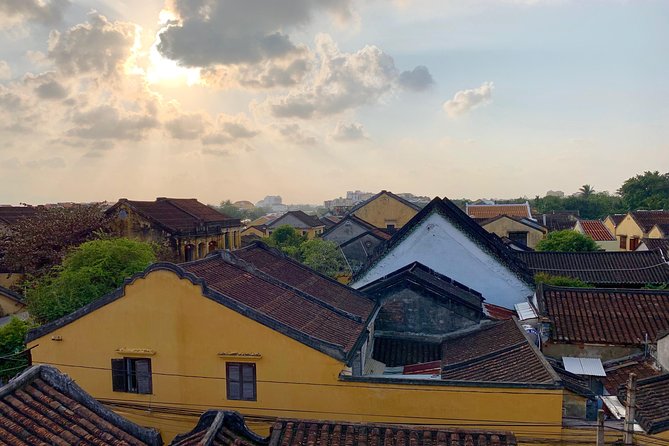 Hoi An By Night with Boat Trip and Foot Massage - Walking through the night market and street food scene