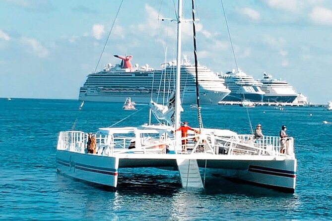Luxury Cozumel Catamaran: Snorkel, Beach Club & Relaxation - Group size, language, and practical comfort