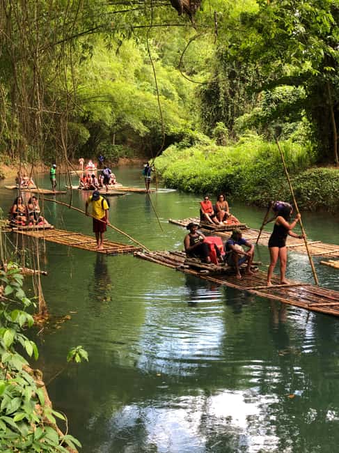 Montegobay: Rafting Tour with Limestone Massage - A bamboo raft on the Great River