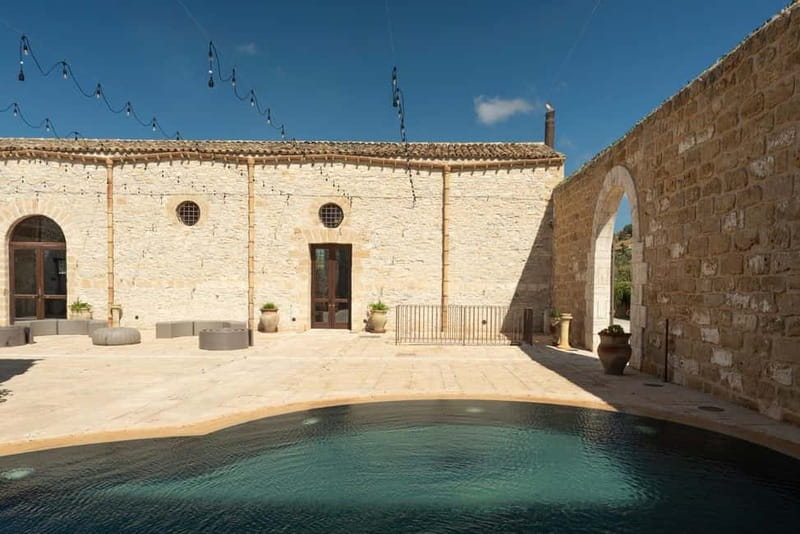 Nature and relaxation by the pool at Baglio Passofondo Estates - Arriving at Tenute Baglio Passofondo
