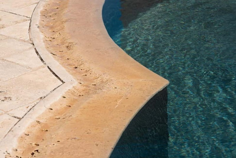 Nature and relaxation by the pool at Baglio Passofondo Estates - The baglio gives the pool a Sicilian character