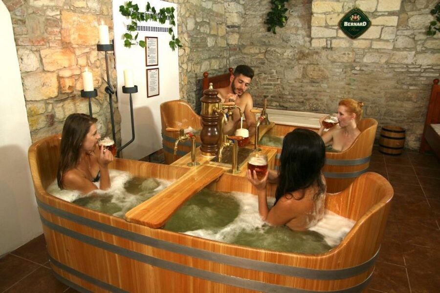 Prague: Bernard Beer Spa with Beer and Massage Option - Entering the hotel and finding the spa