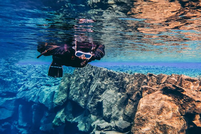 Silfra: Hot and Cold Snorkeling and Spa Tour - Self Drive - Snorkeling through Silfra’s clear water