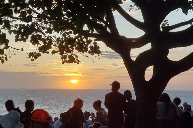 Sunset at Uluwatu Temple and Spa Tour - Entering Uluwatu Temple above the sea
