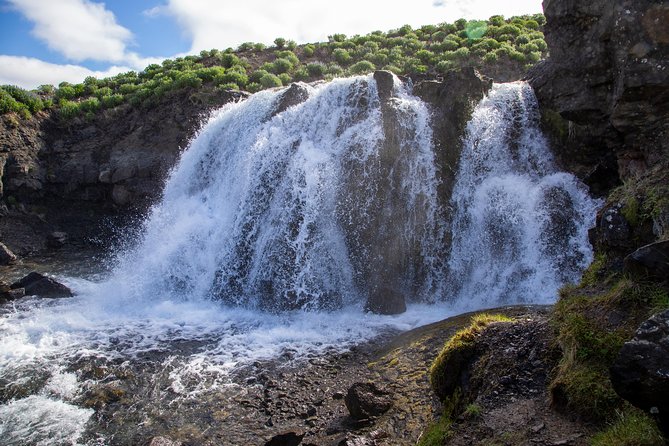 Unique West Iceland and Krauma SPA tour by minibus - Barnafoss adds speed and drama