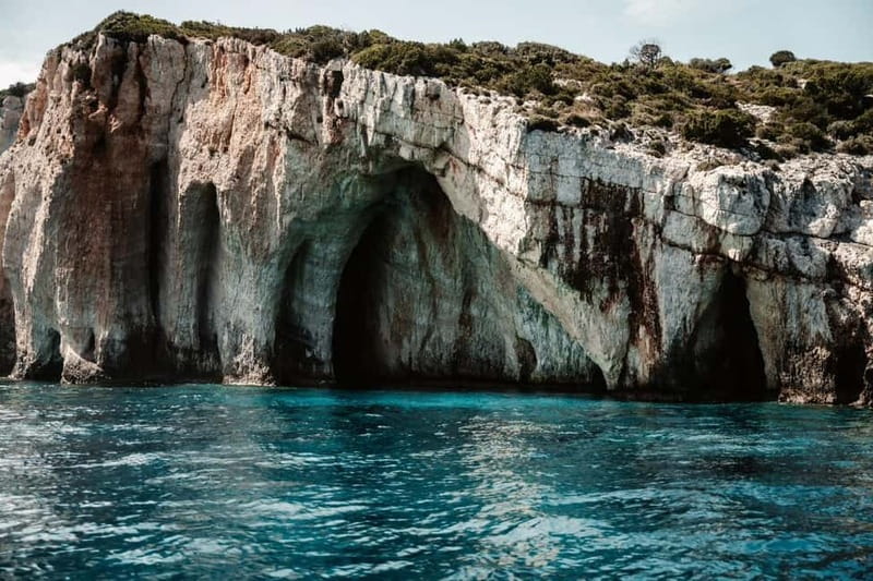 Zakynthos: Shipwreck, Blue Caves and Xigia Natural Spa Tour - Swimming among the Blue Caves